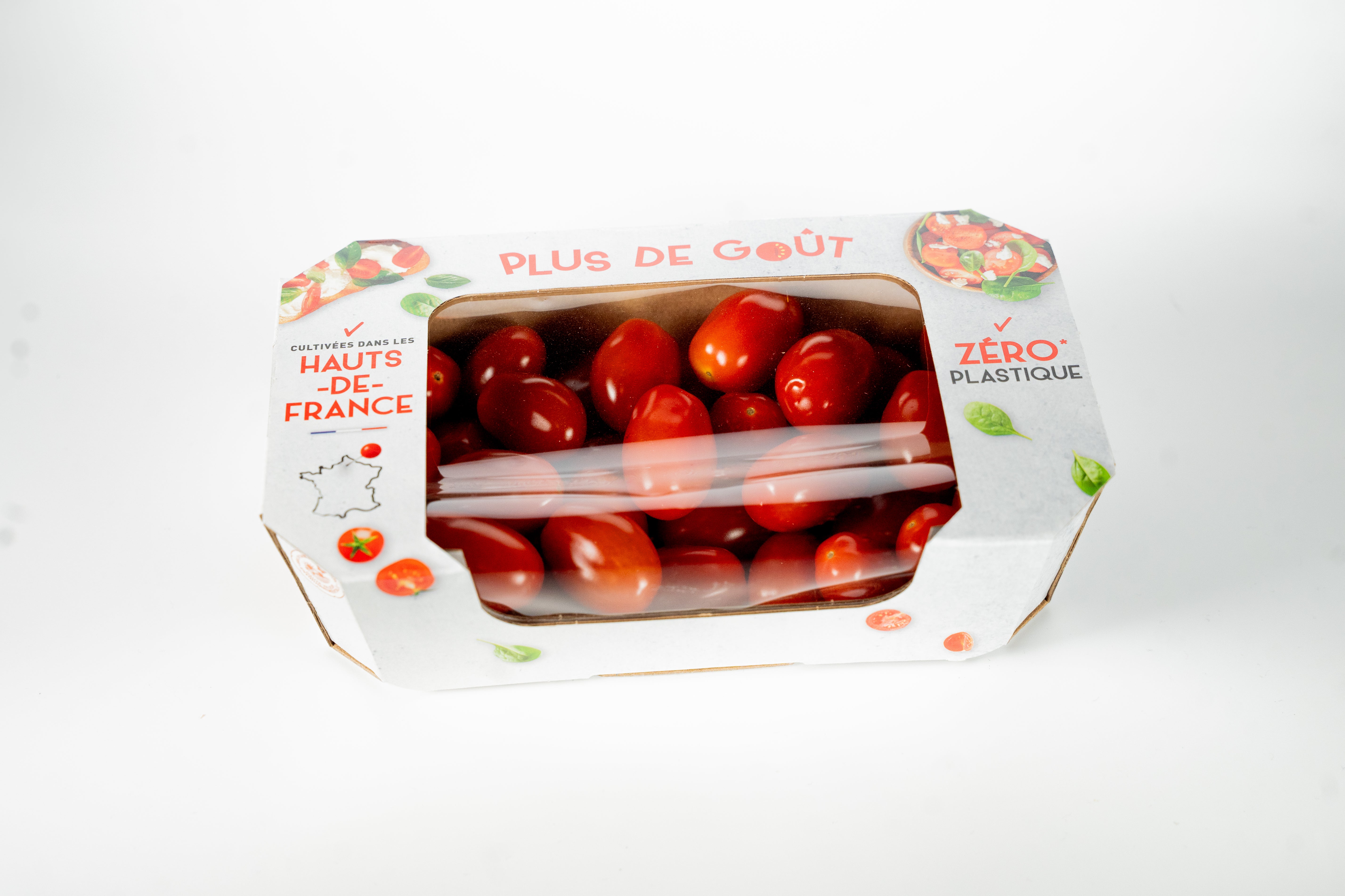 Vue de face barquette en carton contenant des tomates cerises, réalisée par marcojea pour "plus de goût".